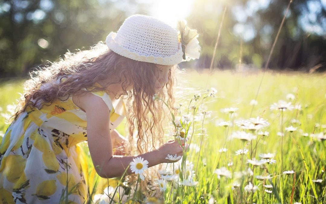 Girl picking flowers